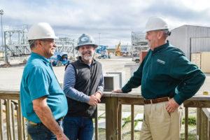 Craig Romero discusses project with Jeff Clement of Dynamic Industries and Iberia Parish Council Member Eugene Olivier